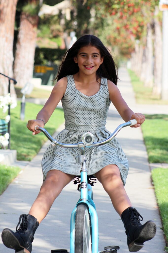 Pre-teen riding bike